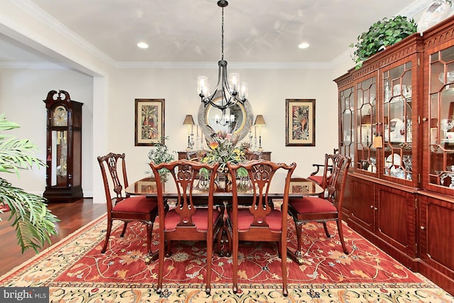 44251 Silverpalm Grove Ter, Leesburg, VA 20176 - dining space with crown molding, a notable chandelier, recessed lighting, and dark wood-type flooring