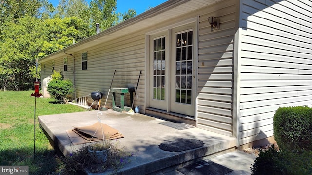 exterior space featuring a lawn and a patio