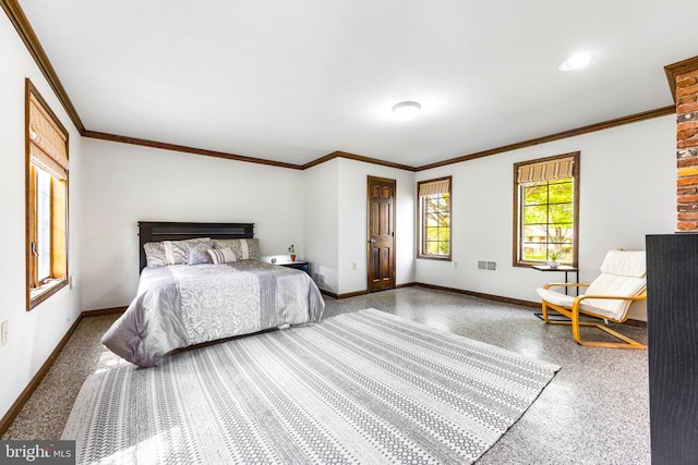 bedroom featuring speckled floor, crown molding, and baseboards