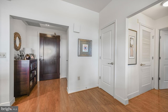 12500 Park Potomac Ave Unit 905South, Potomac, MD 20854 - hall featuring baseboards and light wood finished floors