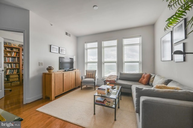 12500 Park Potomac Ave Unit 905South, Potomac, MD 20854 - living area with light wood-type flooring and plenty of natural light