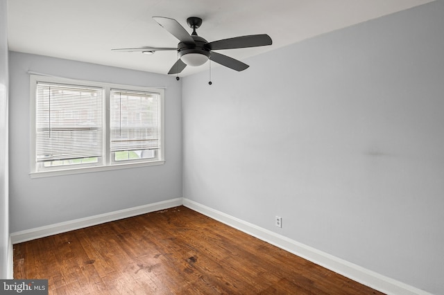 1060 Elm Rd, Baltimore, MD 21227 - empty room featuring baseboards, dark wood finished floors, and a ceiling fan