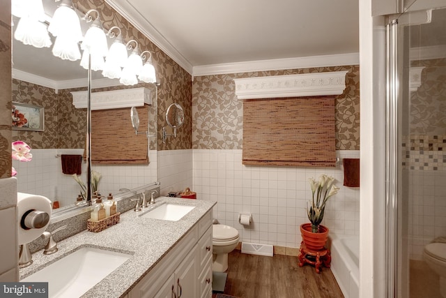 2066 Old York Rd, Burlington, NJ 08016 - full bathroom with toilet, wallpapered walls, wood finished floors, tile walls, and crown molding