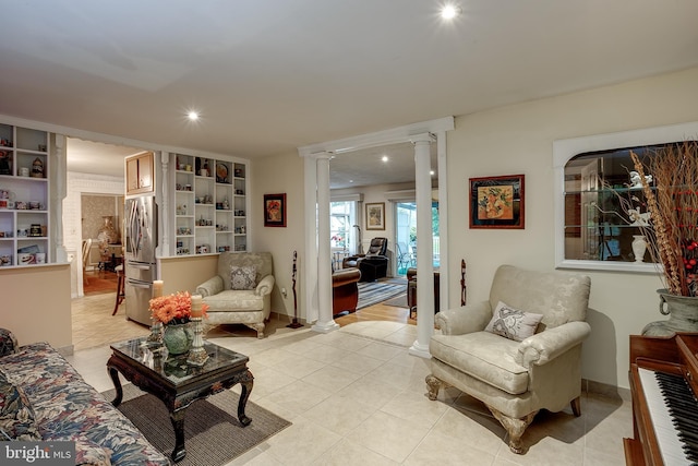 2066 Old York Rd, Burlington, NJ 08016 - living room with ornate columns, light tile patterned flooring, recessed lighting, baseboards, and built in shelves