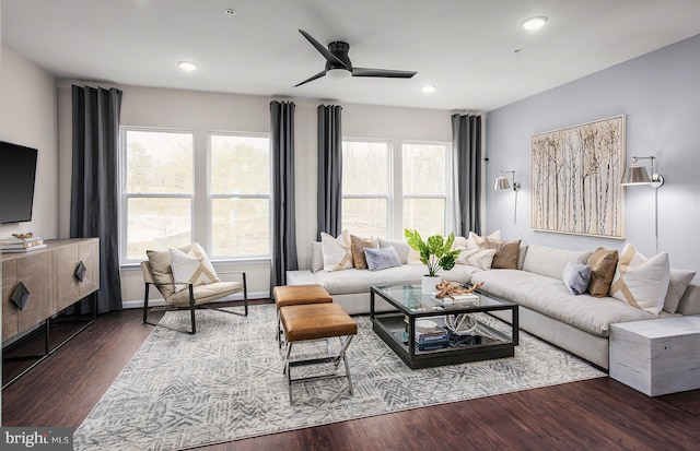 living area featuring recessed lighting, a ceiling fan, and wood finished floors