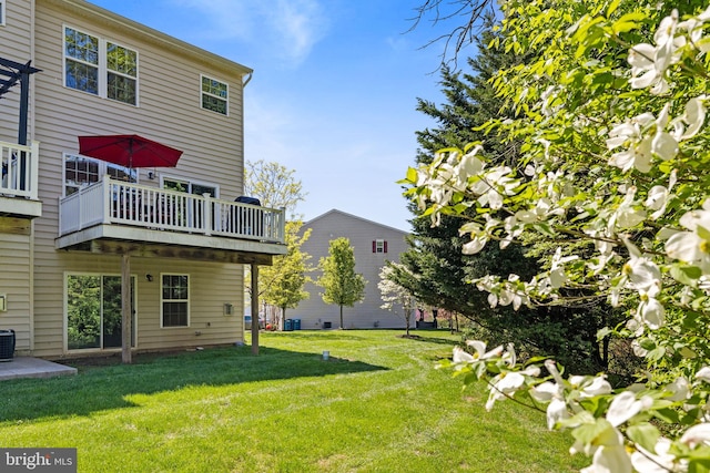 274 Macdonald Ave Unit 22, Wyncote, PA 19095 - back of house with a lawn, central air condition unit, and a deck