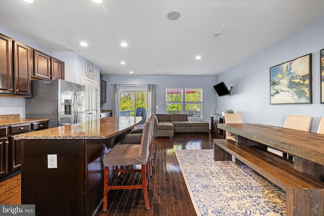 274 Macdonald Ave Unit 22, Wyncote, PA 19095 - kitchen with dark wood-style flooring, light stone countertops, recessed lighting, a center island, and stainless steel fridge with ice dispenser