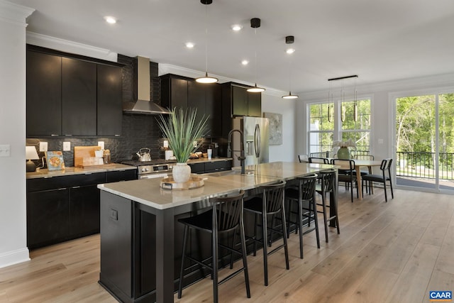 43 Farrow Cir, Charlottesville, VA 22901 - kitchen with wall chimney exhaust hood, ornamental molding, a large island with sink, and a sink