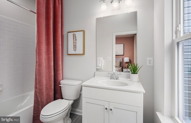 bathroom with tile patterned flooring, toilet, vanity, and shower / bathtub combination with curtain