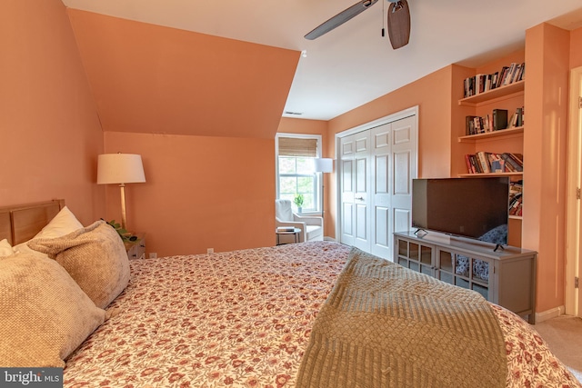 bedroom with ceiling fan, carpet, and a closet