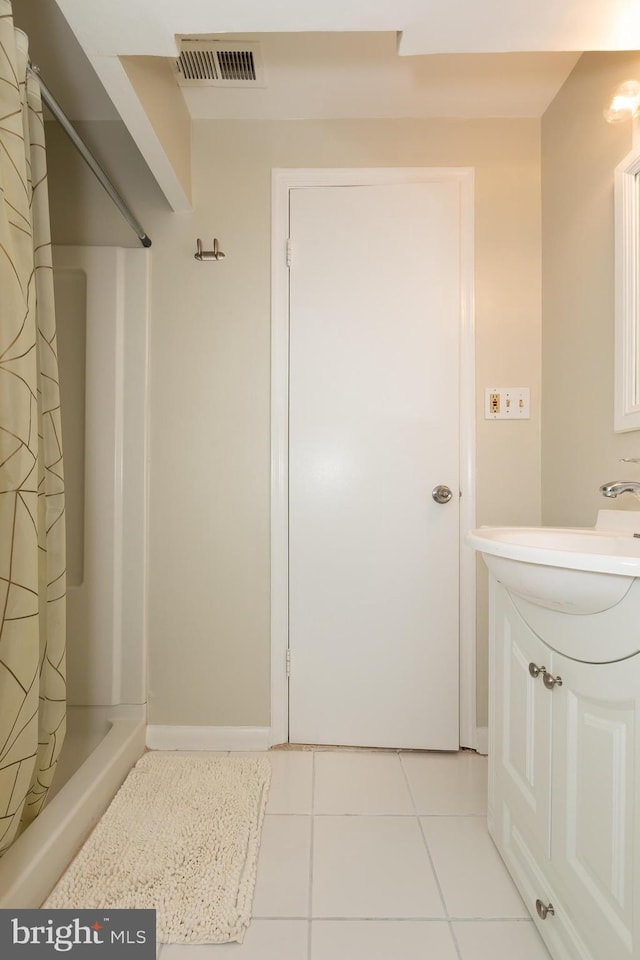 19320 Liberty Heights Ln, Germantown, MD 20874 - full bathroom with tile patterned floors and vanity