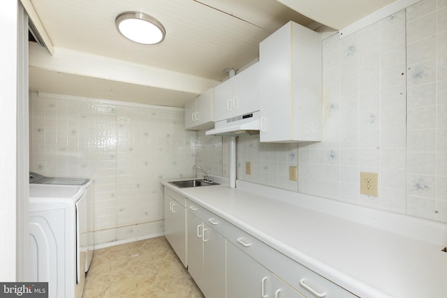 19320 Liberty Heights Ln, Germantown, MD 20874 - washroom featuring cabinet space, independent washer and dryer, and tile walls
