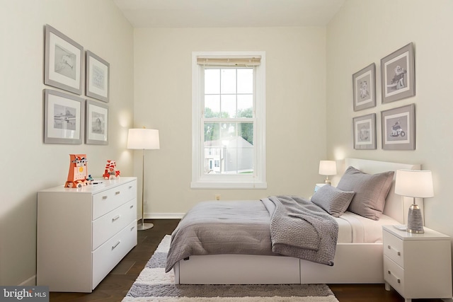 19320 Liberty Heights Ln, Germantown, MD 20874 - bedroom featuring baseboards and dark wood finished floors