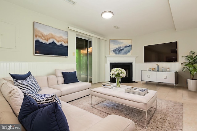19320 Liberty Heights Ln, Germantown, MD 20874 - tiled living area with a fireplace with flush hearth and wainscoting