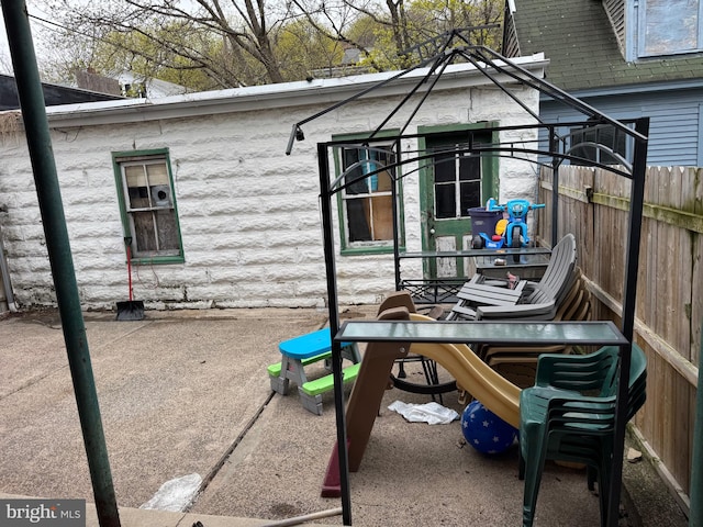 view of patio with fence