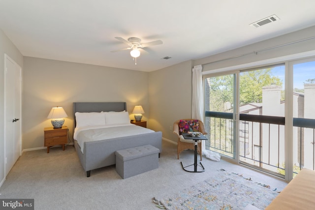 bedroom with carpet floors, baseboards, and visible vents