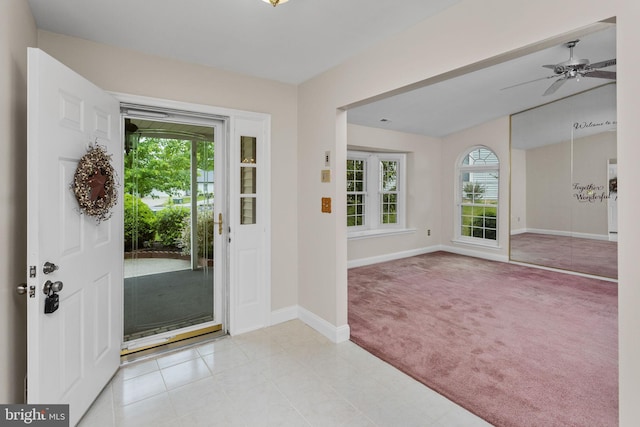 21 Willowwood Ct, Columbus, NJ 08022 - foyer entrance featuring light carpet, baseboards, ceiling fan, and light tile patterned floors
