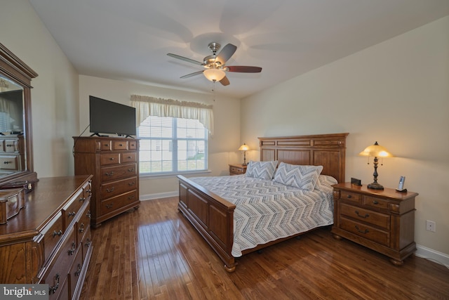 bedroom with dark wood finished floors, baseboards, and ceiling fan
