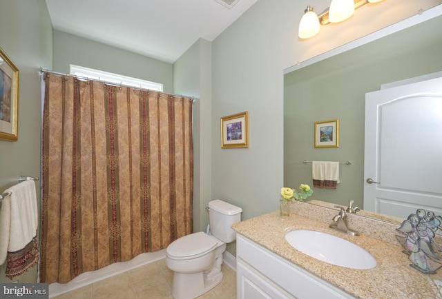 full bathroom with tile patterned floors, curtained shower, toilet, and vanity