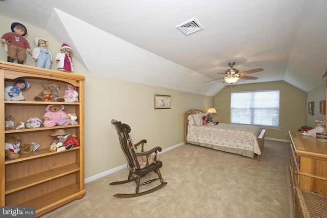 carpeted bedroom with baseboards, visible vents, ceiling fan, and vaulted ceiling