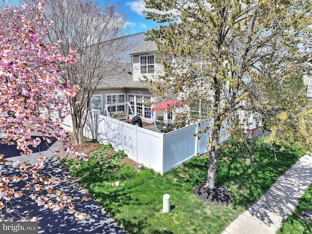 43295 Ardmore St, Ashburn, VA 20147 - back of house with roof with shingles and fence