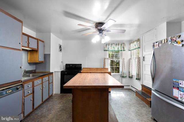 kitchen with ceiling fan, dishwasher, a sink, freestanding refrigerator, and black range with electric cooktop