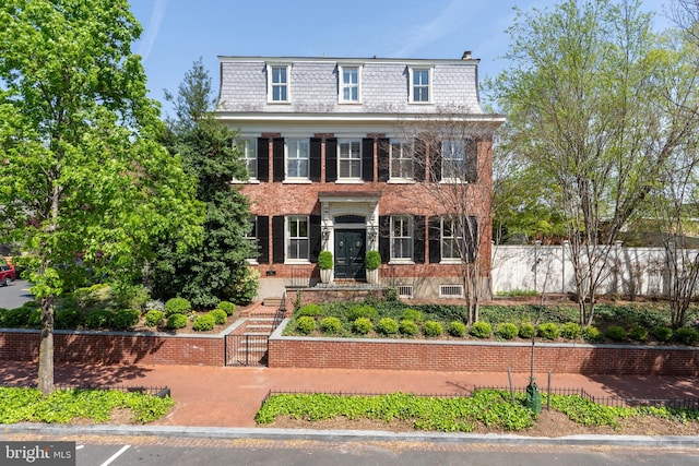 700 6th St SE, Washington, DC 20003 - second empire-style home featuring brick siding, a high end roof, mansard roof, and fence