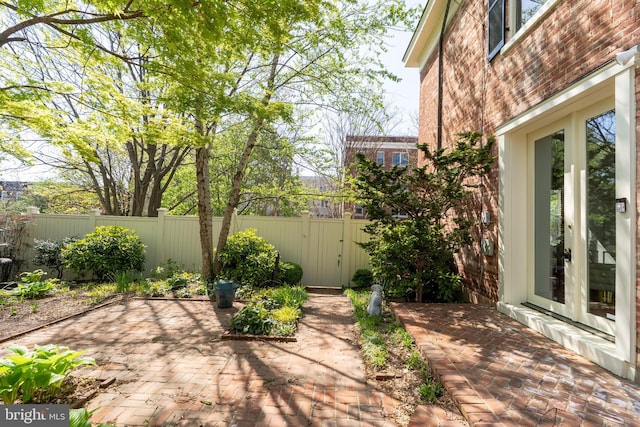 700 6th St SE, Washington, DC 20003 - view of patio / terrace with a fenced backyard, a gate, and french doors