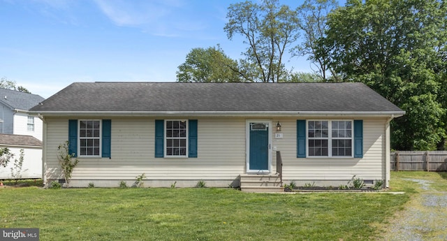 21 Thorn St, Magnolia, DE 19962 - ranch-style home with fence, entry steps, and a front lawn