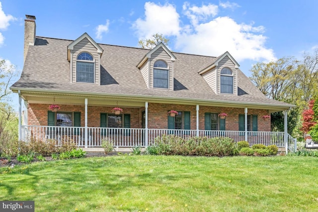 1008 N Ridge Rd, Perkasie, PA 18944 - cape cod-style house featuring a porch, a front yard, a chimney, and brick siding
