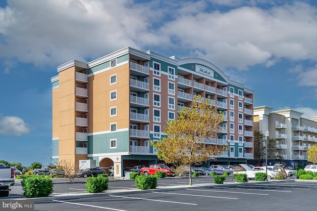 4201 Coastal Hwy Unit 116, Ocean City, MD 21842 - view of building exterior with uncovered parking