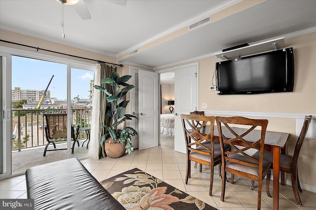 4201 Coastal Hwy Unit 116, Ocean City, MD 21842 - dining area featuring ceiling fan, visible vents, ornamental molding, and light tile patterned floors