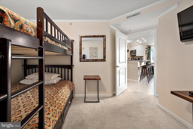4201 Coastal Hwy Unit 116, Ocean City, MD 21842 - bedroom featuring carpet floors, crown molding, visible vents, and baseboards