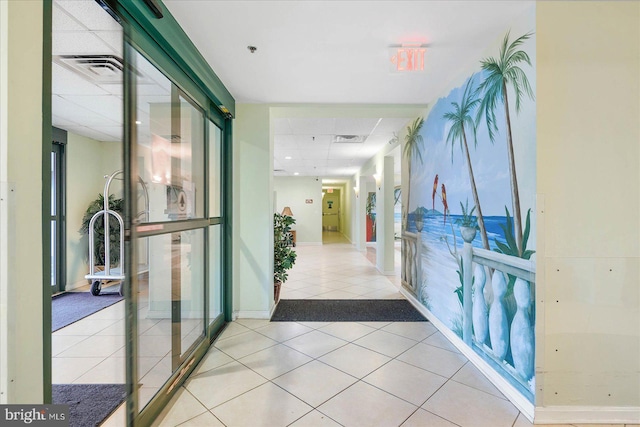 4201 Coastal Hwy Unit 116, Ocean City, MD 21842 - hall featuring a paneled ceiling, visible vents, and tile patterned flooring