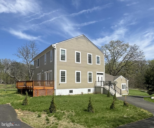 12304 Popes Head Rd, Fairfax, VA 22030 - view of side of home with a wooden deck and a yard