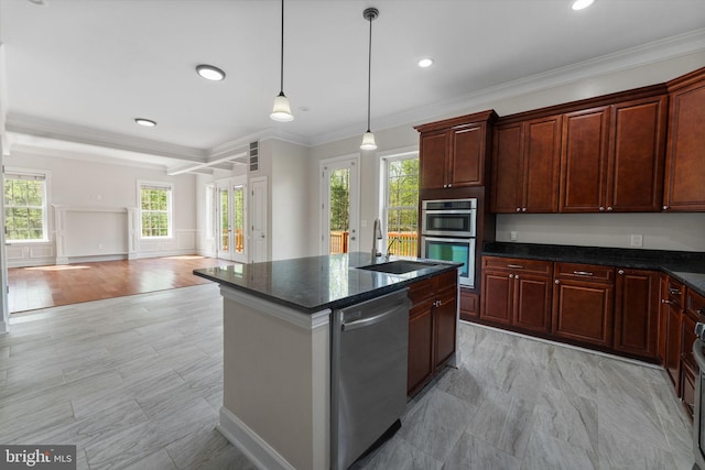 12304 Popes Head Rd, Fairfax, VA 22030 - kitchen featuring crown molding, a sink, a kitchen island with sink, stainless steel appliances, and decorative light fixtures
