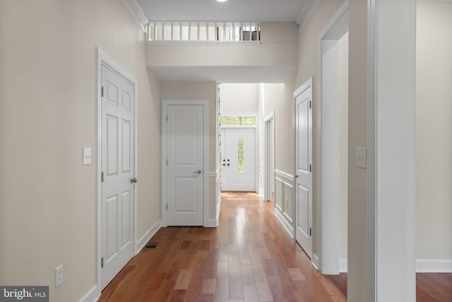 12304 Popes Head Rd, Fairfax, VA 22030 - hall with visible vents, baseboards, and wood finished floors