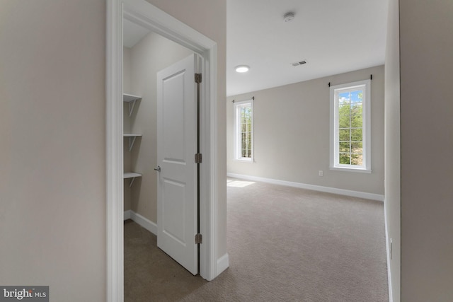 12304 Popes Head Rd, Fairfax, VA 22030 - corridor with visible vents, baseboards, and carpet