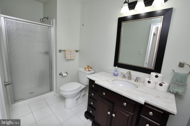 full bathroom with vanity, tile patterned flooring, a shower stall, and toilet