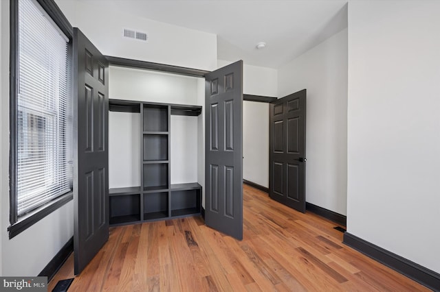 2931 W Susquehanna Ave, Philadelphia, PA 19121 - unfurnished bedroom with baseboards, visible vents, and light wood-type flooring