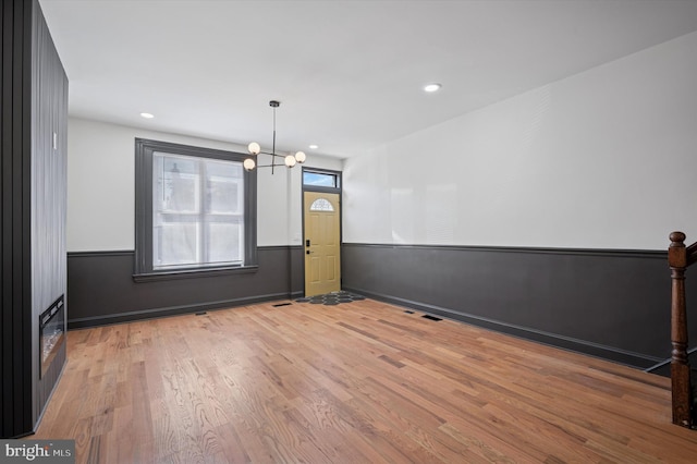 2931 W Susquehanna Ave, Philadelphia, PA 19121 - unfurnished dining area with light wood-style flooring, recessed lighting, and a chandelier
