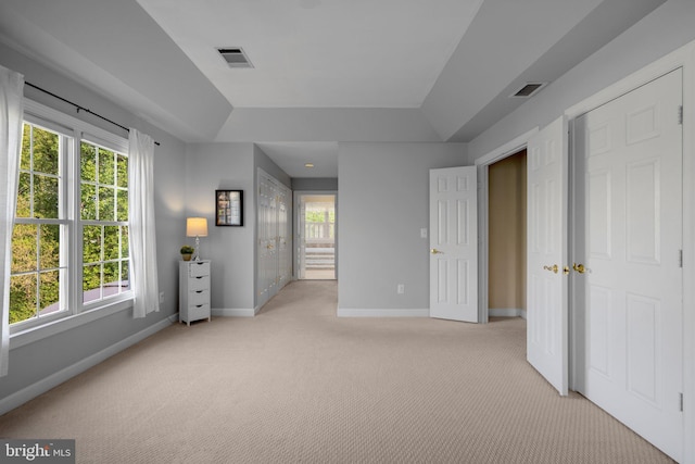 19009 Old Baltimore Rd, Brookeville, MD 20833 - unfurnished bedroom with baseboards, multiple windows, light carpet, and visible vents