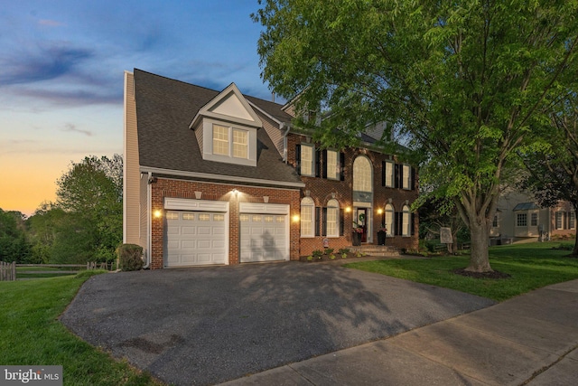 19009 Old Baltimore Rd, Brookeville, MD 20833 - view of front of house with a lawn, a garage, driveway, and brick siding