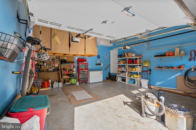 19009 Old Baltimore Rd, Brookeville, MD 20833 - garage featuring a garage door opener and refrigerator