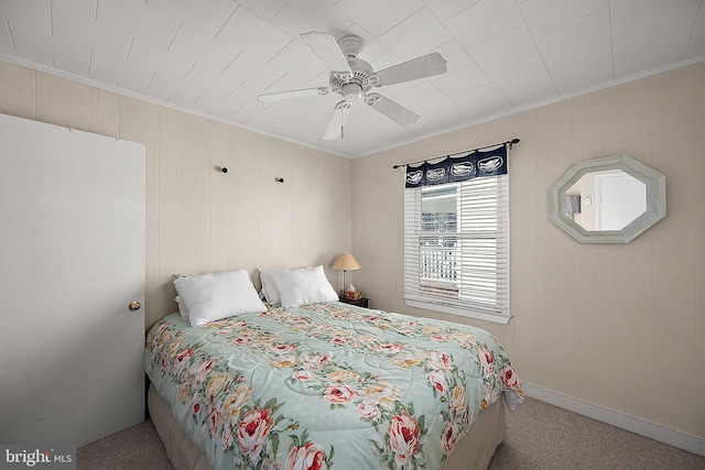 12506 Assawoman Dr, Ocean City, MD 21842 - carpeted bedroom with a ceiling fan, baseboards, and ornamental molding