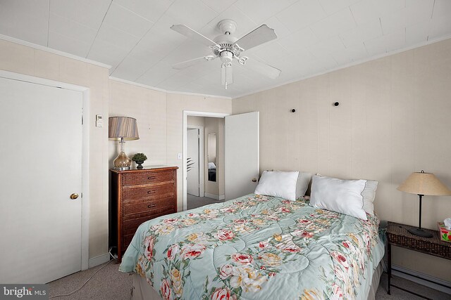 12506 Assawoman Dr, Ocean City, MD 21842 - carpeted bedroom featuring a ceiling fan and ornamental molding