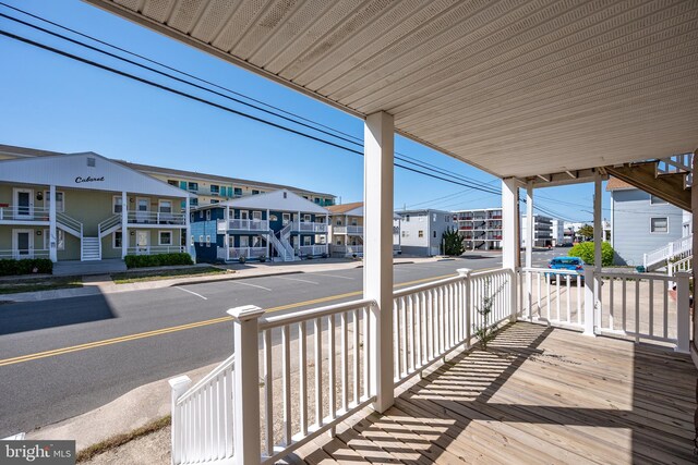 12506 Assawoman Dr, Ocean City, MD 21842 - wooden terrace featuring a residential view