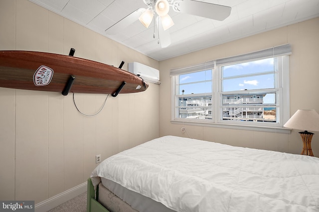 12506 Assawoman Dr, Ocean City, MD 21842 - bedroom with carpet flooring, a wall unit AC, and ceiling fan