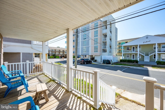 12506 Assawoman Dr, Ocean City, MD 21842 - wooden terrace featuring a porch