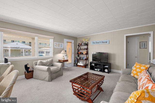 12506 Assawoman Dr, Ocean City, MD 21842 - living room featuring carpet floors, baseboards, and ornamental molding